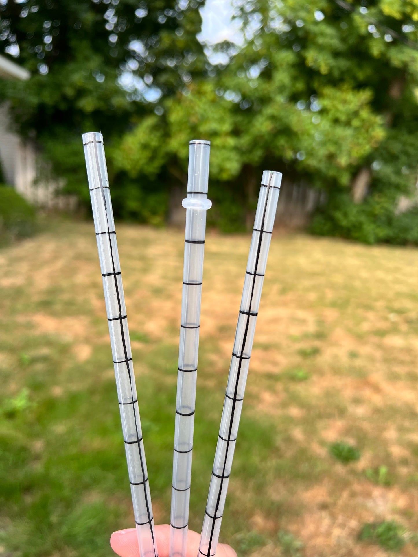 White with black lines straws